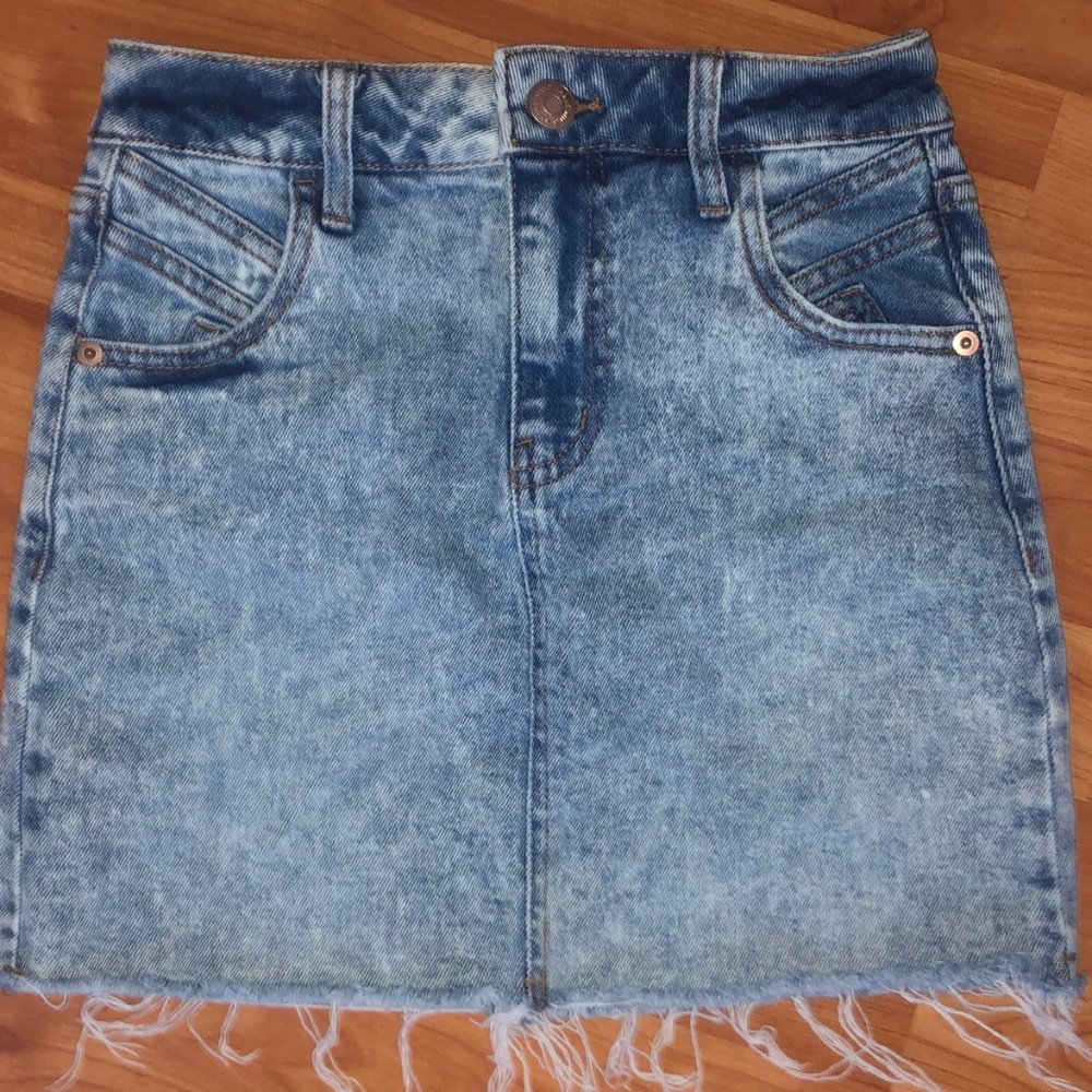 distressed light-washed jean skirt